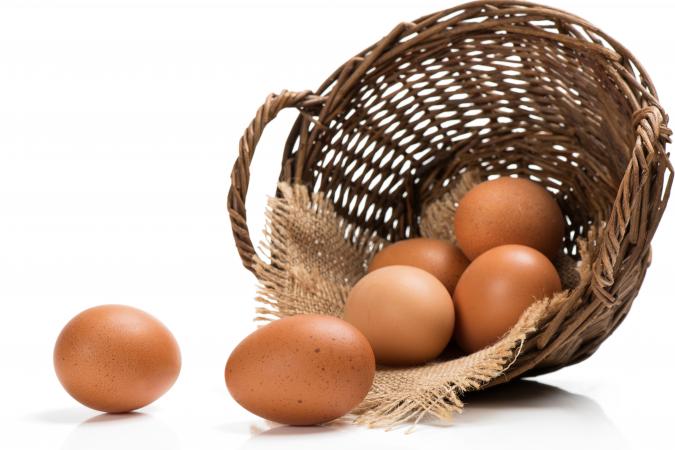 Eggs spilling out of a basket