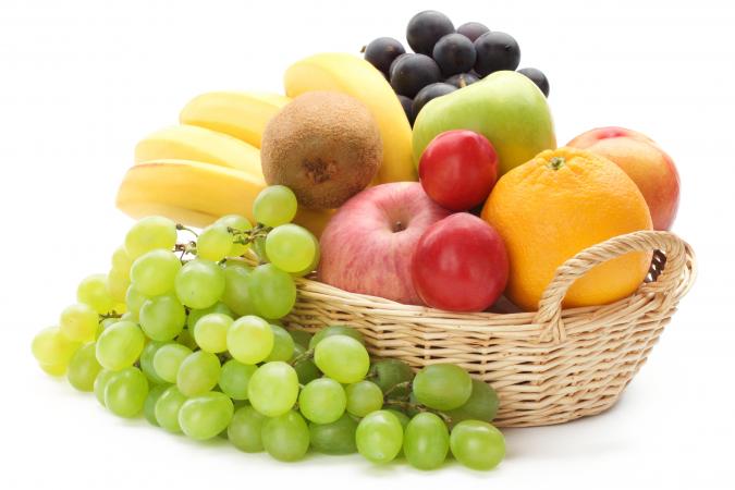 Assorted fruit piled in a basket